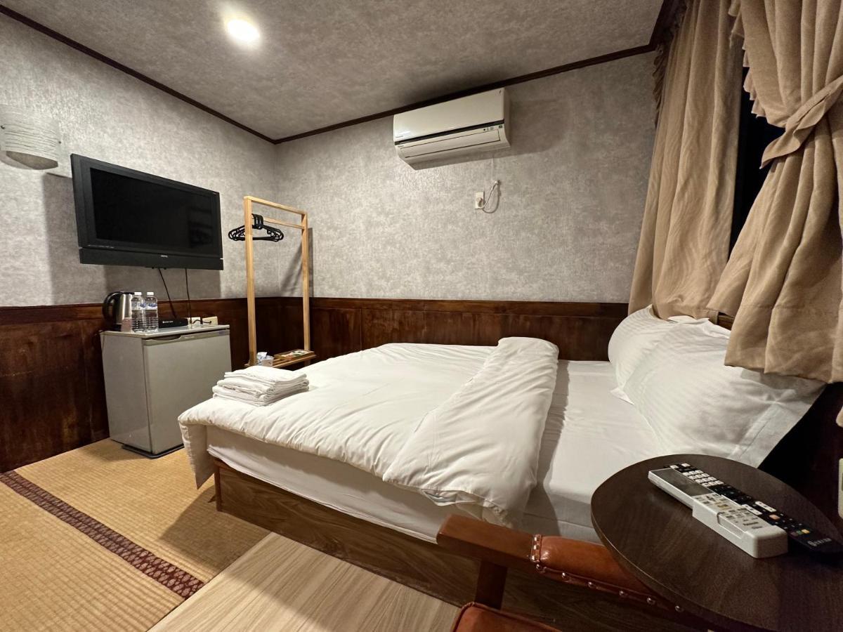 Ming Ren Hotspring Hotel Цзяосі Екстер'єр фото